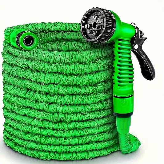 Expandable garden hose in full extended length with spray nozzle